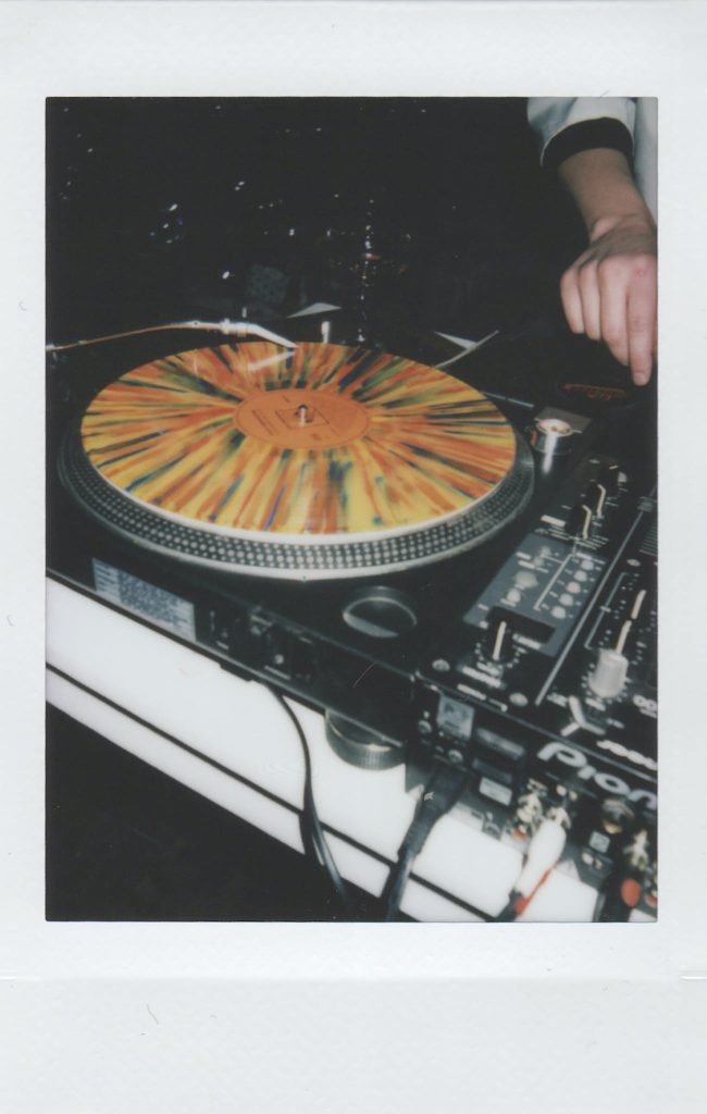Person Using Black Turntable